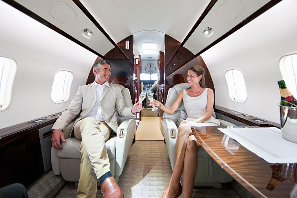 married couple booking private jet