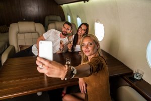 friends on a private jet charter